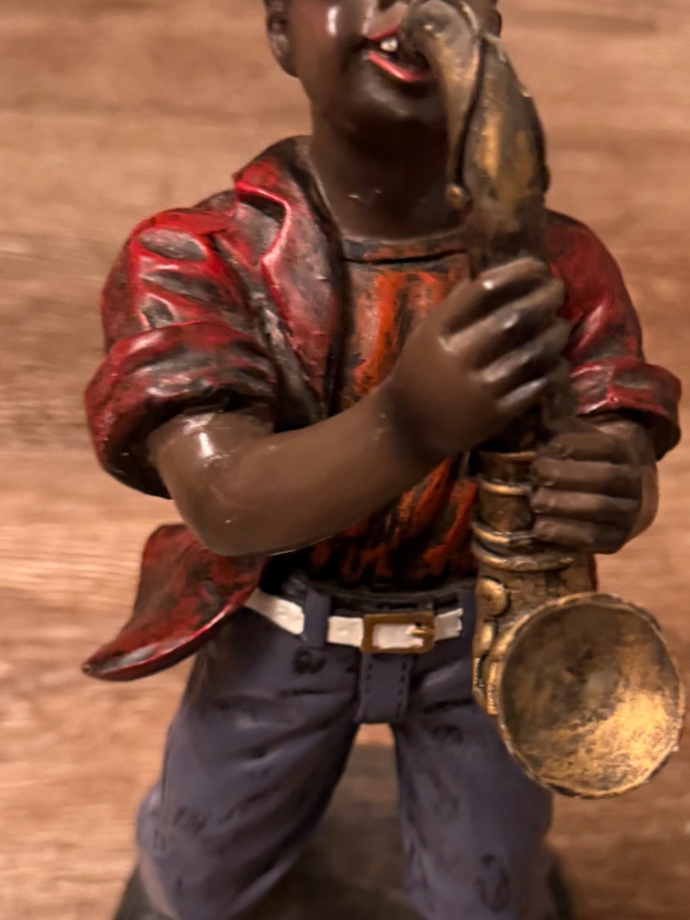 Red and Blue Saxophonist Figurine - Playful Musical Decor